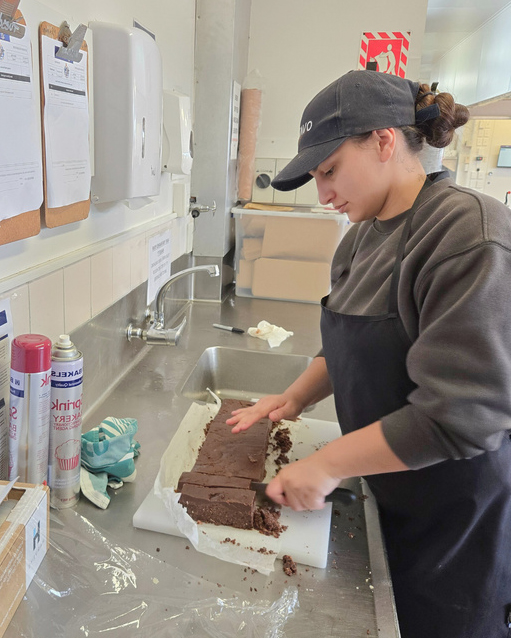 Catering Assistant Kyah preparing dietaries for morning tea.